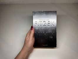 ROMAN: Sebastian Fitzek, Mimik