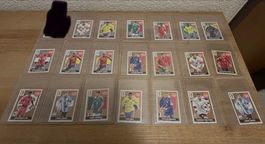 Extra Sticker Wm2026/2022 Silber/Bronze/Lila