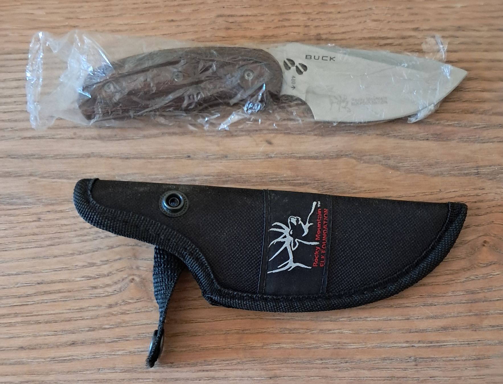 Buck Altre raccolte & rarità: Neuwertiges Buck Hunter Messer, Holzgriff – Nuovo e nell'imballaggio originale da Adlikon b. Andelfingen venduto da Kraemse 1