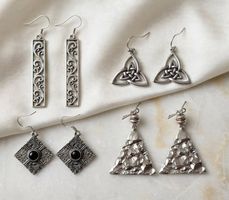 Quattro paia orecchini pendenti argento metallo nuovo