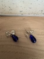 Orecchini fiocco con cristalli blu usato