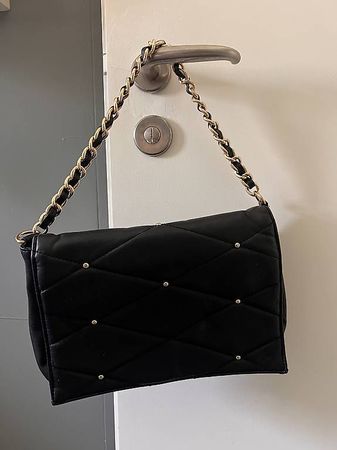Borsa nera con brillantini oro