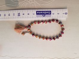 Schönes rosa/gold Armband mit Anhänger von moshi 8.5cm breit
