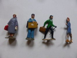 4 Metall-Spielfiguren,antik,handbemalt,Pöstler,Reisende,Kind