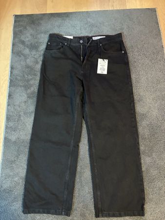 Herren Jeans BERSHKA Baggy schwarz Grösse 44 neu