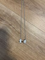 Herzige Halskette mit Päärchen