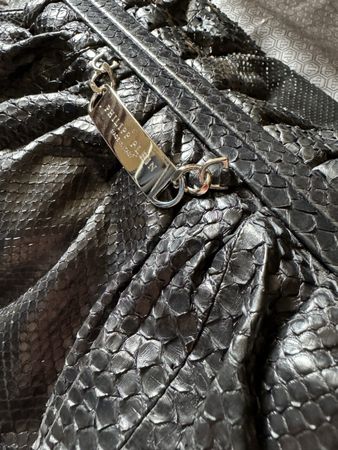 Philipp Plein Pythonleder Clutch Bag mit Nappa