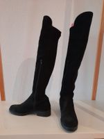 Bottes noires très hautes
