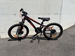 Vélo 20 pouces orange noir freins à disque