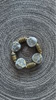 Armband mit Perlen und Goldakzenten