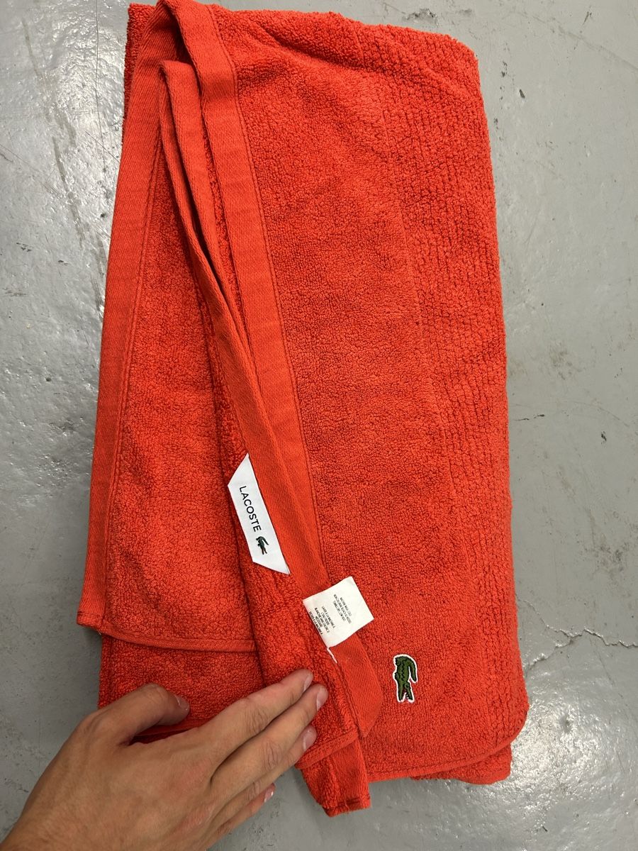 Lacoste Serviettes de bain: Lacoste Badetuch orange – D'occasion à Bern par floorball_zoro