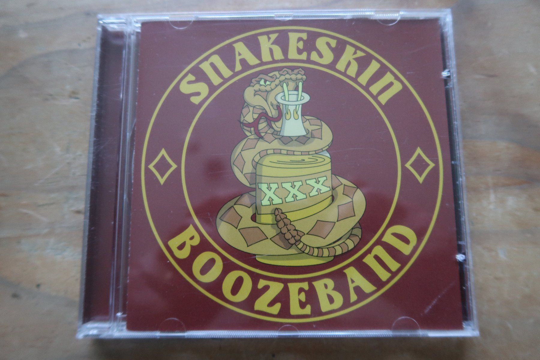 CD: SNAKESKIN - BOOZEBAND - SWISS HARD ROCK - CD – Usato da Basel venduto da Patiscat