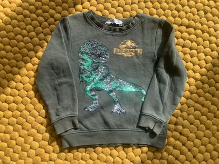 Pull Jurassic World H&M à paillettes, taille 110/116
