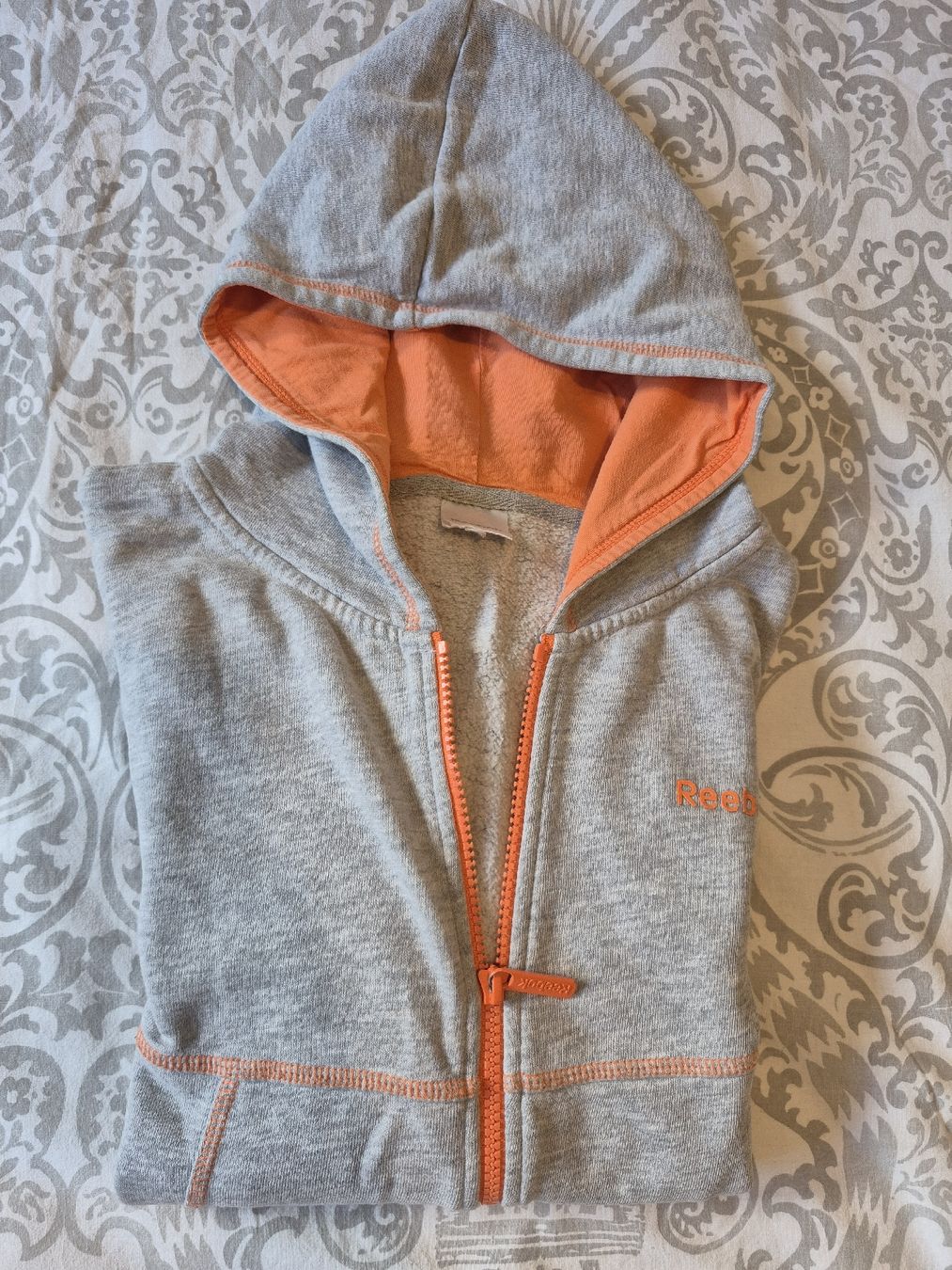 Giacche: Sweat à capuche Reebok gris orange fermeture éclair taille S – Usato da St-Pierre-Clages venduto da _RV