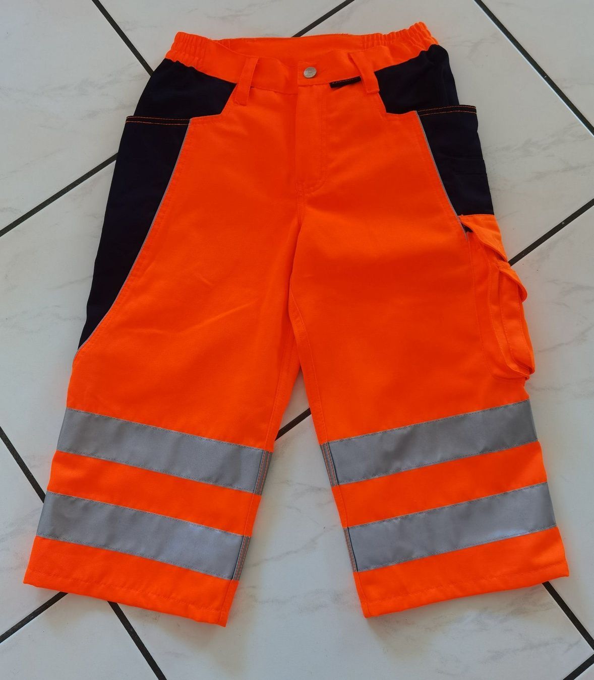 Pantaloni: Qualitex PRO Warnschutz Arbeitsshorts Gr. 42 – Nuovo e nell'imballaggio originale da Uerkheim venduto da Kaufoption 1