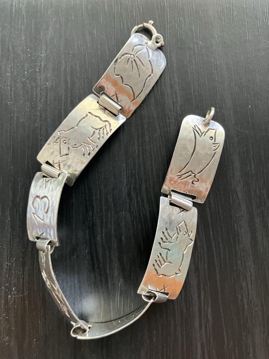 Bracciali & Braccialetti: Antikes Silberarmband mit Glückssymbolen – Usato da Düdingen venduto da Kalalua 1