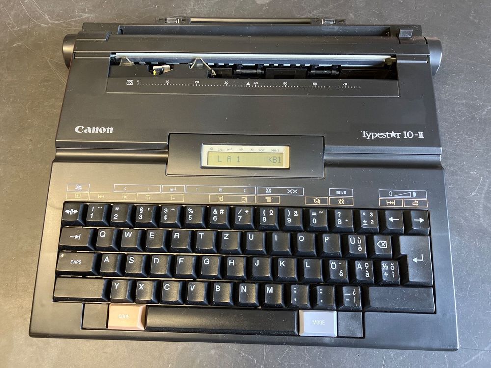 Machine à écrire électrique Canon typestar 10 - Rakuten