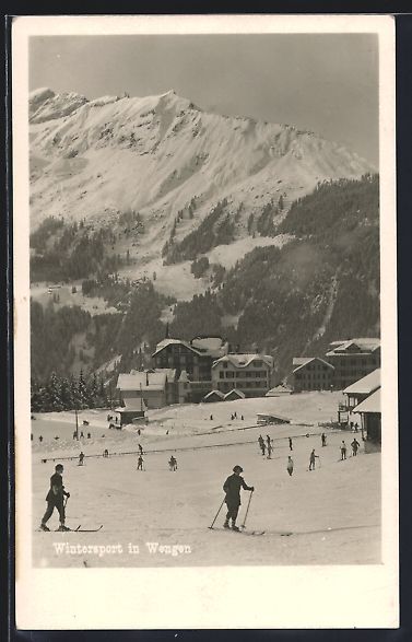 Cartoline postali: AK Wengen, Teilansicht mit Skiläufern – Usato da Berlin venduto da bartko-reher