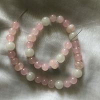 Reststück Perlenstrang "Quarz" rosa+weiss 10-15mm