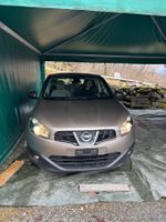 Voiture Nissan Qashqai de couleur brune occasion, 2L benzine