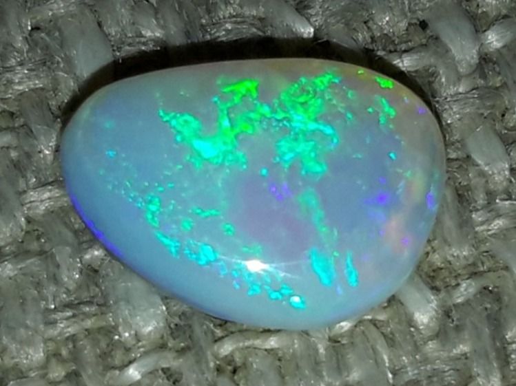 Pietre preziose: Australischer Flashfire Kristall Opal 0.9ct – Nuovo e nell'imballaggio originale da Uerkheim venduto da Winwinner 1