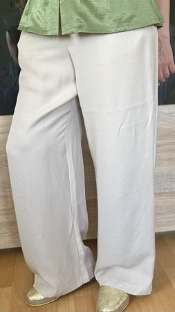 Pantalon fluide beige taille 40, parfait pour l'été