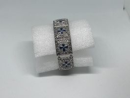 Bracciale elastico di bigiotteria a placche argentate