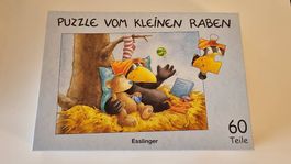 Puzzle vom kleinen Raben