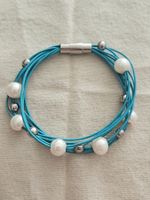 Armband türkis Lederoptik mit Perlen