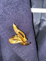 Jolie broche en métal doré signé P&M