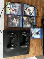 PlayStation 4 with 5 games 