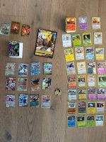 Viele Pokemon Karten und Coin