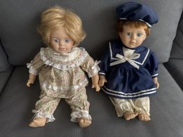 2 poupées anciennes en porcelaine en bon état