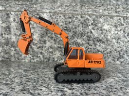 Raupenbagger Atlas 1702 , 1:50 , NZG