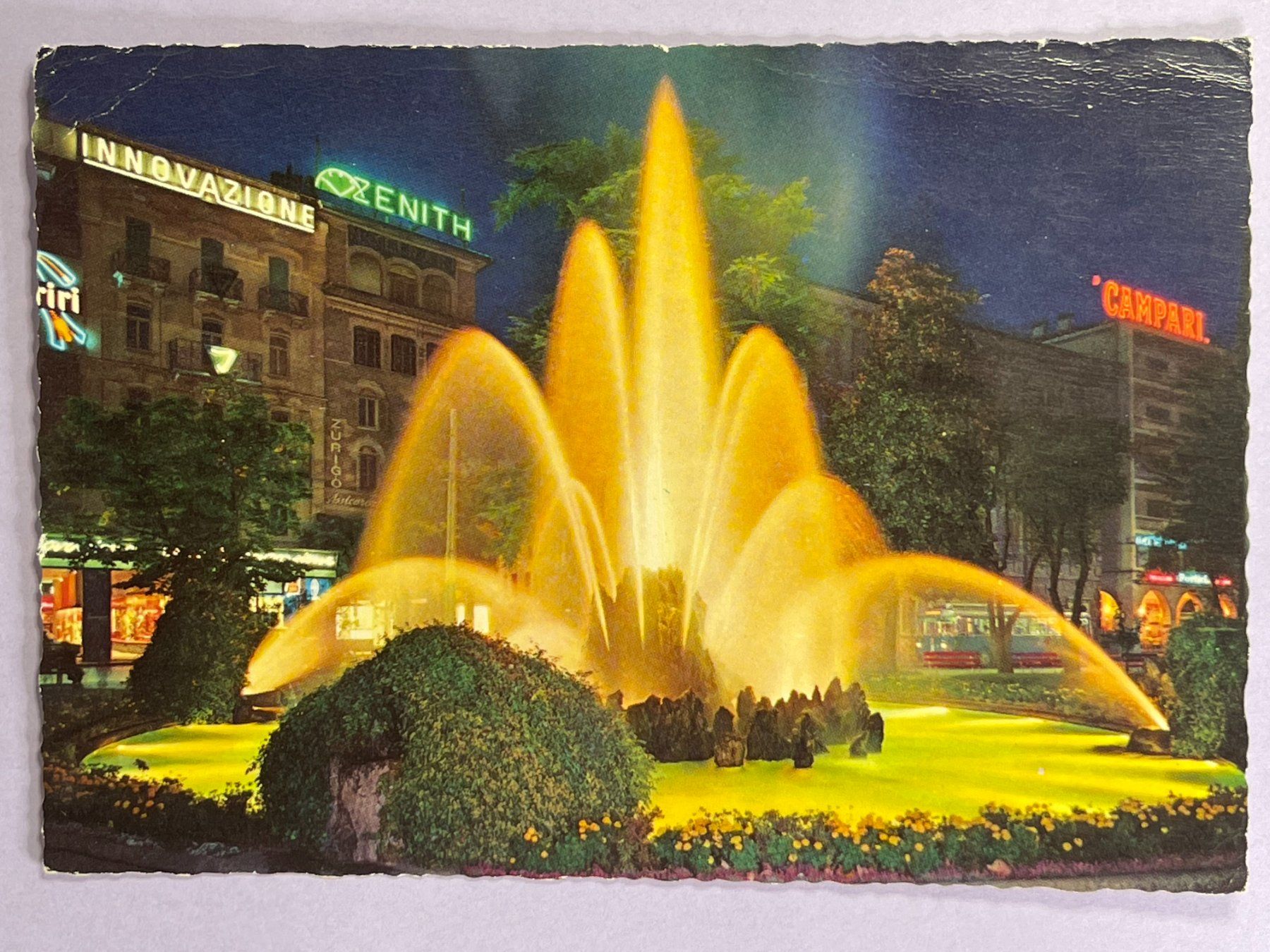 Cartoline postali: Lugano - Piazza Manzoni e fontana di notte – Usato da Steg VS venduto da danwer74