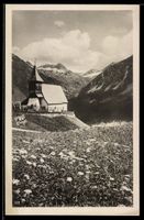 AK Arosa, Kirche mit Blumenwiese und Bergpanorama