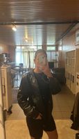 Veste en cuir véritable Wings noire/Echtlederjacke von Black