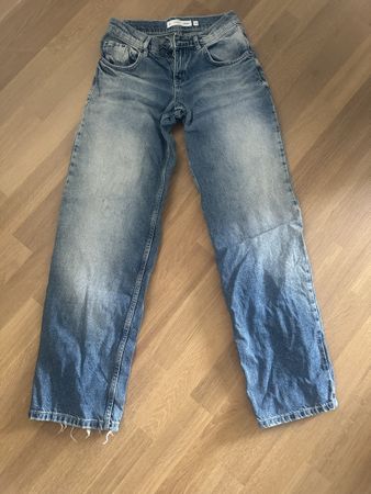Subdued Low Waist Jeans, Size 38
