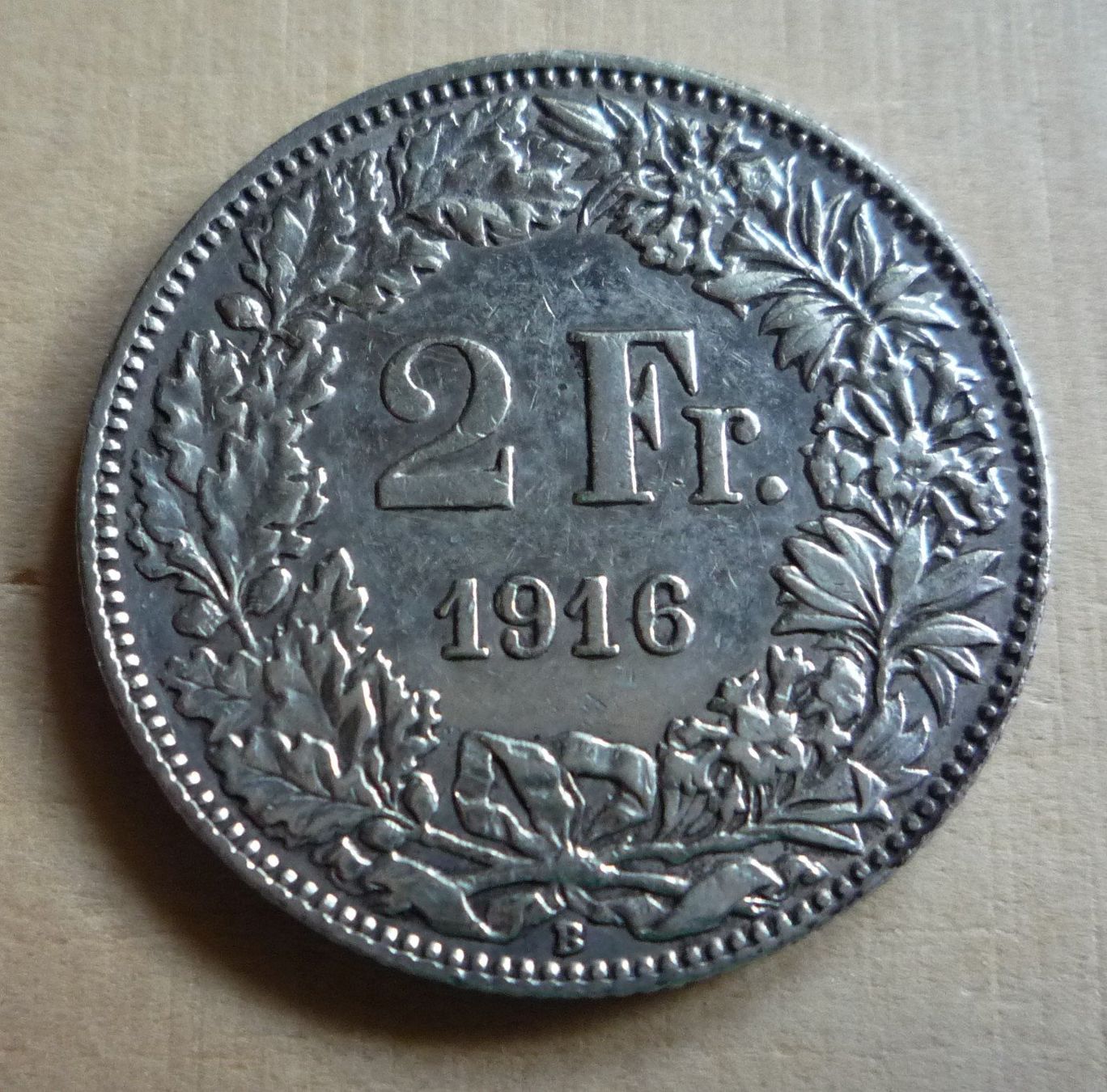Tutti le monete: 2 Franken 1916, unz, Kat. 650.-- – Usato da Rieden SG venduto da Sammelfreund