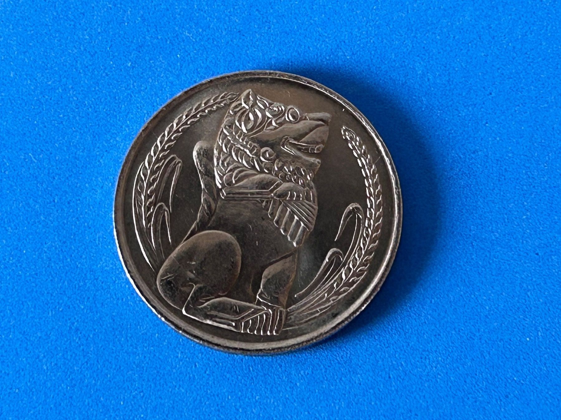 Tutti le monete: Singapore - 1 Dollar 1982 – Usato da Corcelles NE venduto da AJKader 5