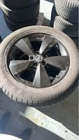 Jantes alu Skoda avec pneus hiver état usagé