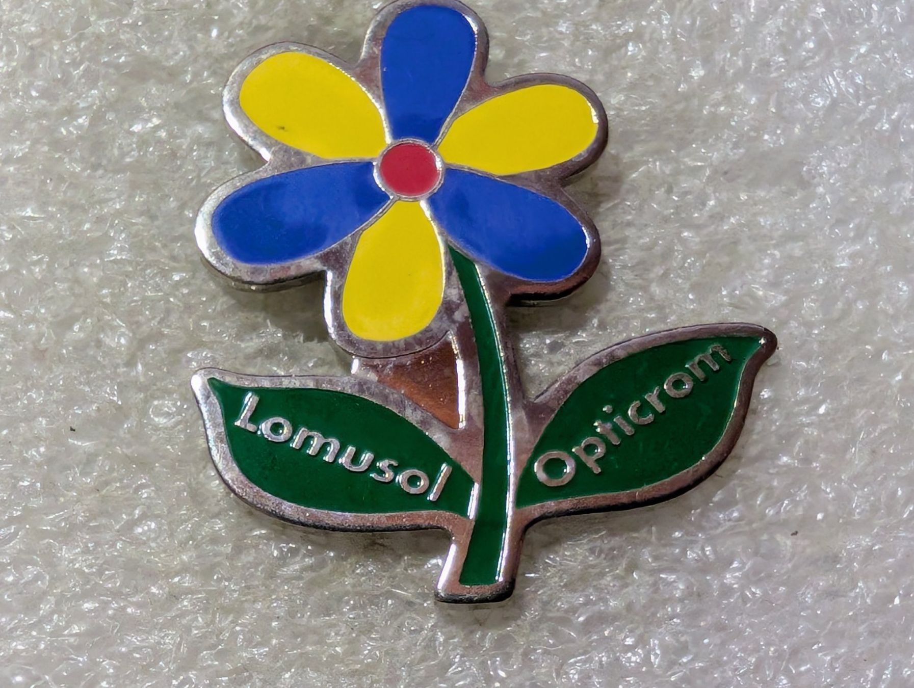 Placchette & Badge: Ansteckpin 173: Lomusol Opticrom – Usato da Oppligen venduto da Pin-Fall-Shop