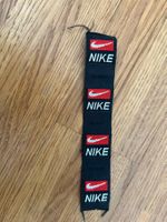Markenetikett NIKE zum Nähen für Kleider