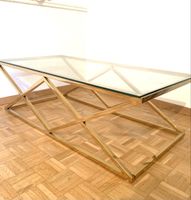 Table basse rectangulaire plateau en verre et doré