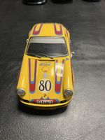 Porsche 911 RS Modellauto gelb 1:18 
