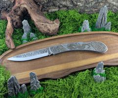 Elegantes Klappmesser mit Ziergravur & Lederscheide