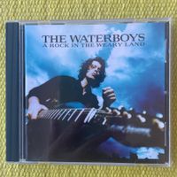 THE WATERBOYS-A ROCK IN THE WEARY LAND
