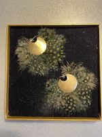 brass and feather earrings K.Makriyianni