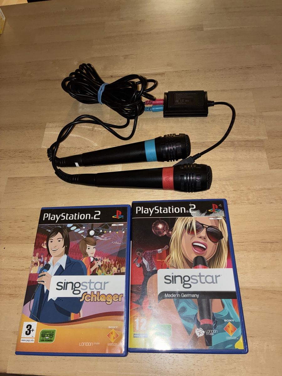 Giochi: PS2 Singstar Mikrofone und zwei Spiele – Usato da St. Silvester venduto da Fragoli