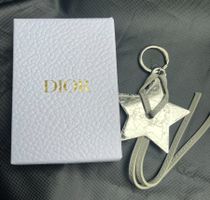 Christian Dior Schlüsselanhänger Stern Motiv – Around the Wo